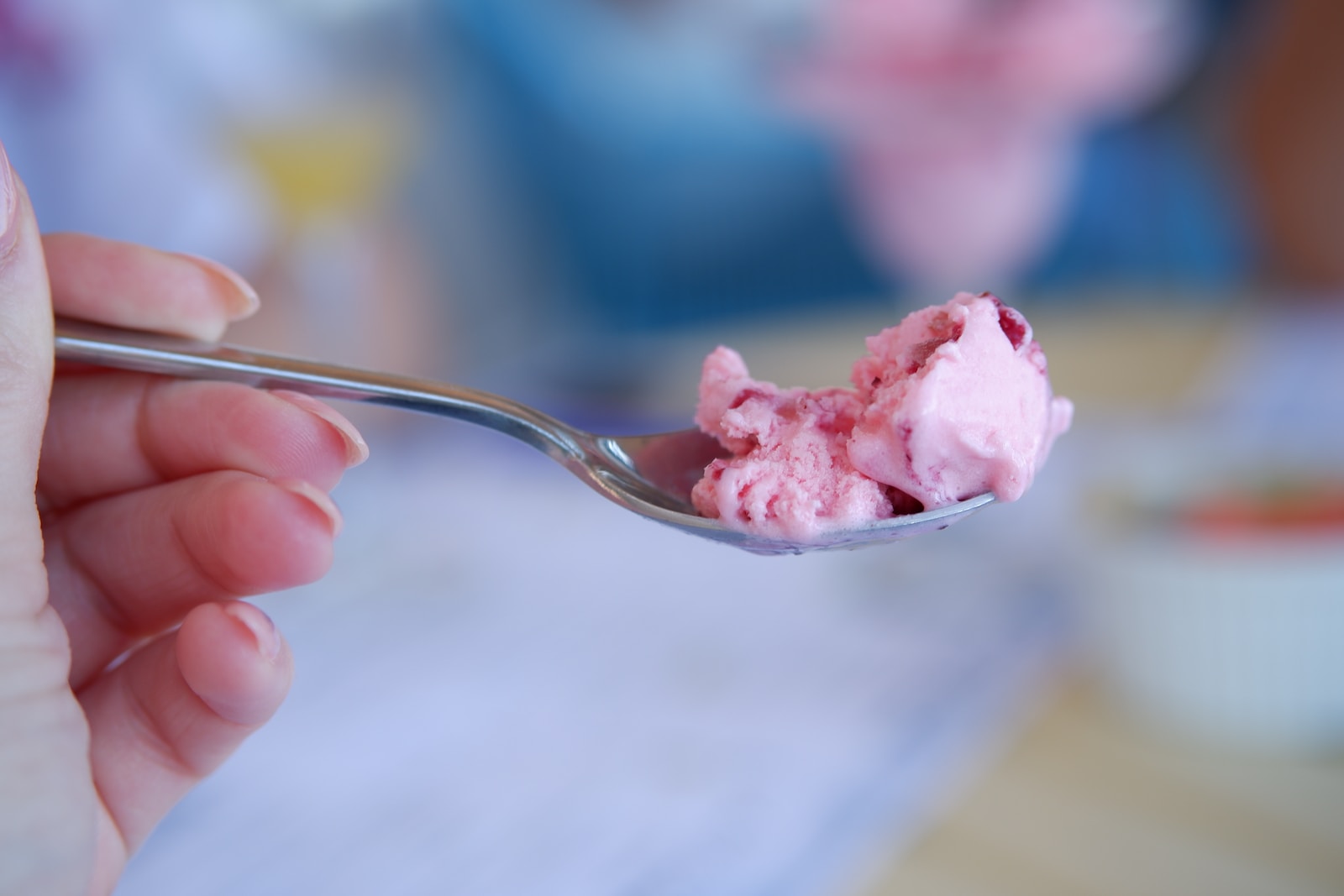 pink ice cream in clear glass cup